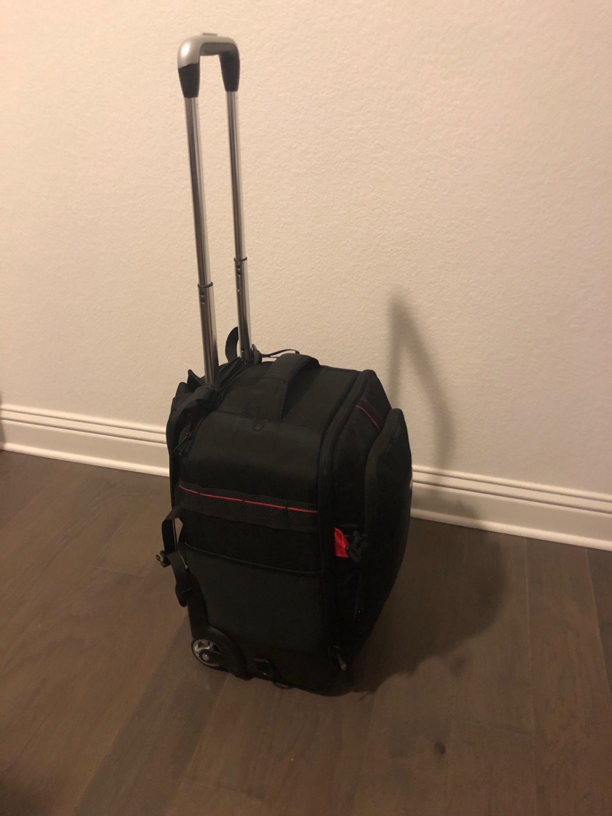 Neewer 2-in-1 Rolling Camera Backpack Trolley Case - Anti-Shock Detachable Padded Compartment, Hidden Pull Bar, Durable, Waterproof for Camera,Tripod,Flash Light,Lens,Laptop for Air Travelling(Black) customer photo 2