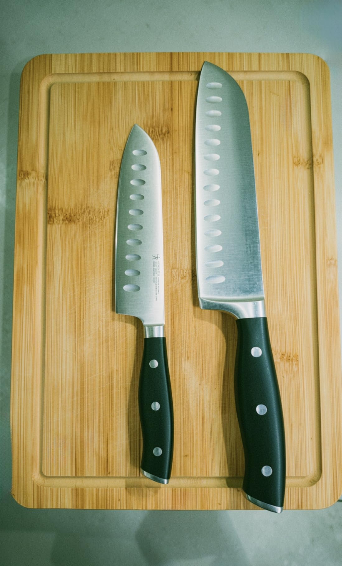 HENCKELS Forged Accent Razor-Sharp 7-inch Hollow Edge Santoku Knife, Black, German Engineered Informed by 100+ Years of Mastery customer photo 1