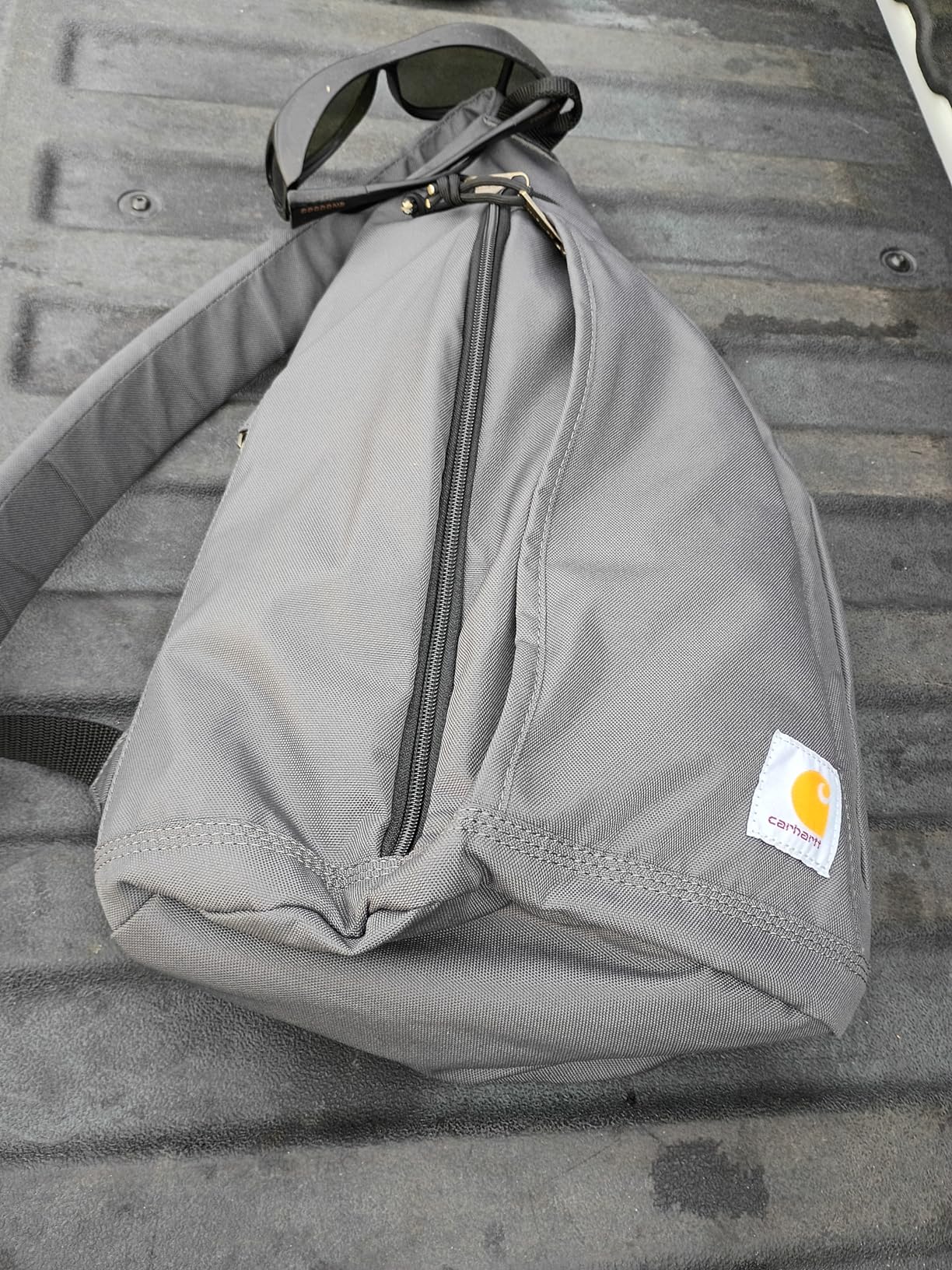 Carhartt Durable Sling Bag, Crossbody Backpack with Side Release Buckle, Tablet Sleeve and Adjustable Strap, Black customer photo 1