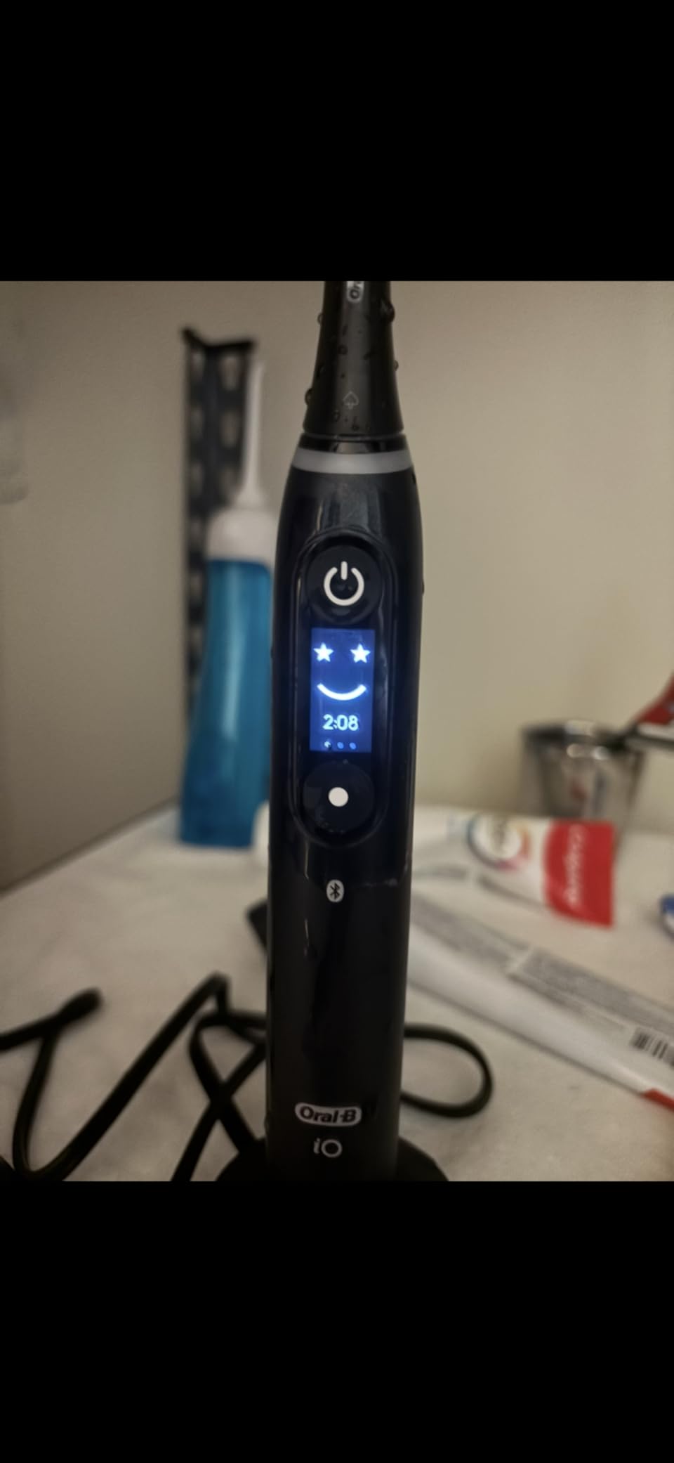 Oral-B iO Deep Clean + Protect Rechargeable Electric Toothbrush, Black, iO Series 7, 2 Replacement Brush Heads, Charging Travel Case customer photo 2