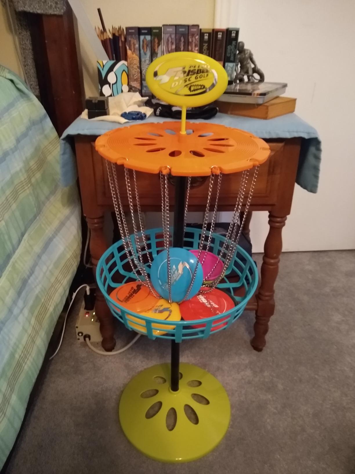 Wham-O Mini Frisbee Golf Set, 28-inch Tall Frisbee Golf Target with 6 Mini Discs, Portable Disc Golf Starter Toy Set for Indoor and Outdoor customer photo 1