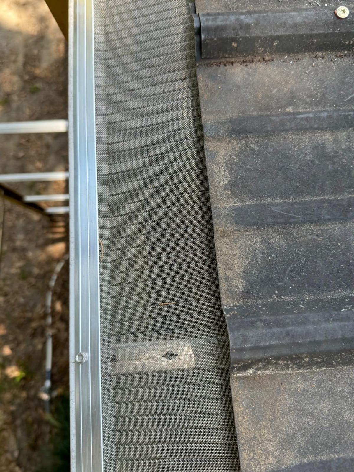 RAPTOR GUTTER GUARD - 48 FT. Contractor Grade Stainless Steel Micro-Mesh Gutter Guard Kit with Screws Included, Fits 6 in. & 7 in. Gutters, DIY-Friendly customer photo 1