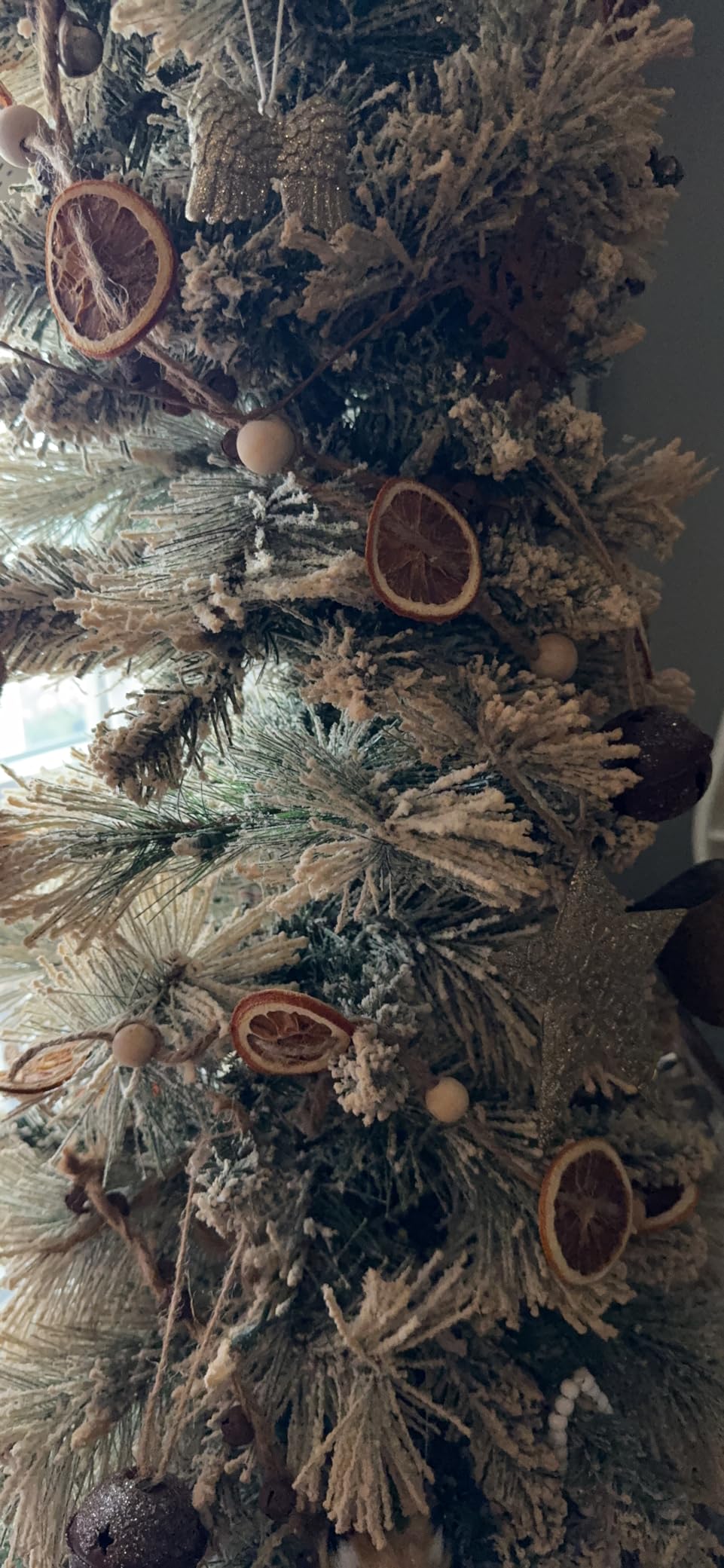 Puleo International 4.5ft Pre-Lit Flocked Portland Pine Pencil Christmas Tree with 100 Clear Lights, 195 Realistic Dense Snow Flocked Branch Tips, Easy Setup Artificial Trees with Sturdy Metal Stand customer photo 2