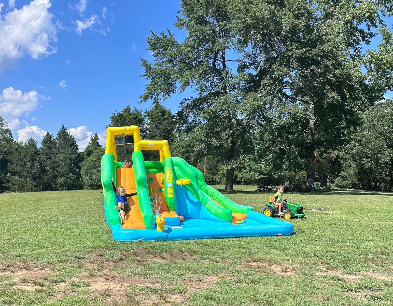 BOUNTECH Inflatable Water Slide, Dual Slides Giant Water Park Jump Castle 6 in 1 with Blower for Outdoor Racing Fun, Climbing Wall, Blow up Water Slides Inflatables for Big Kids 3-10 Outdoor Indoor customer photo 2