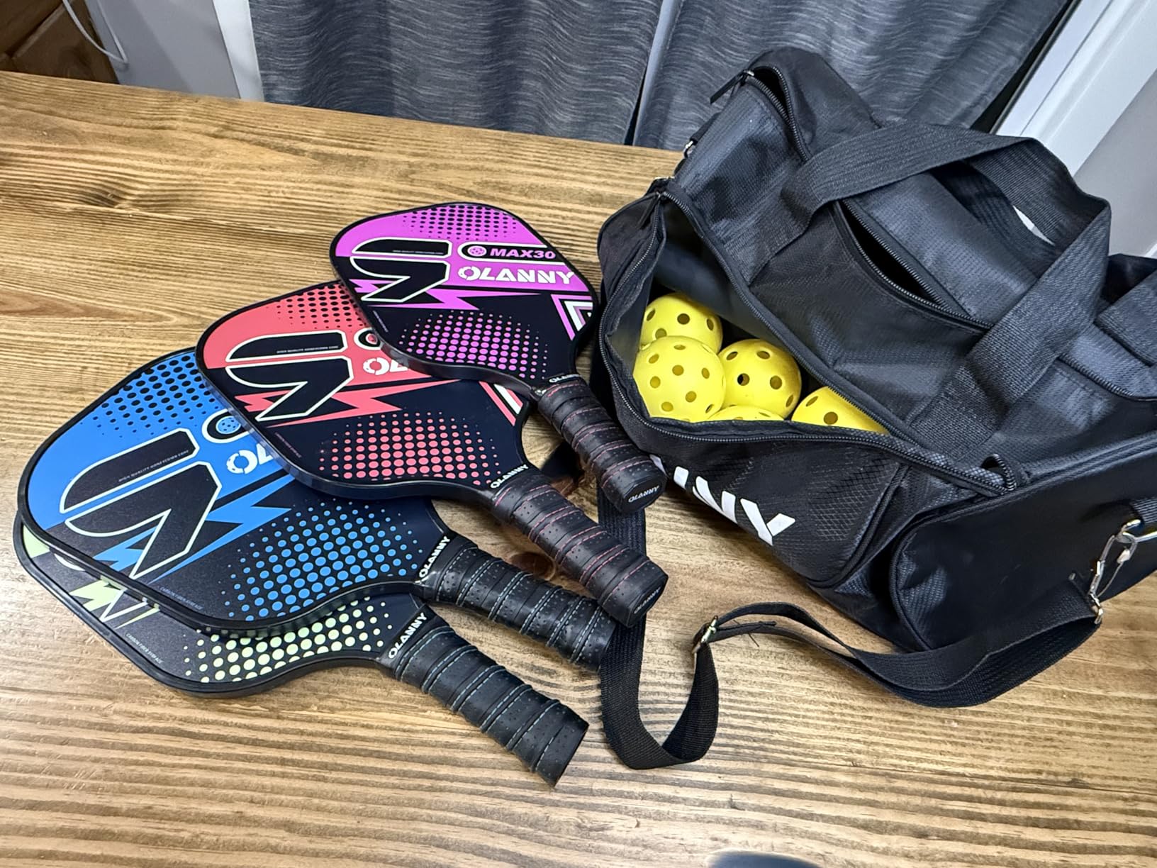 OLANNY Graphite Pickleball Paddles Set- Premium Rackets Fiber Face & Polymer Honeycomb Core Pickleball Set Includes Pickleball Paddles + Pickleball Balls+ Replacement Soft Grip + 1 Bag customer photo 1