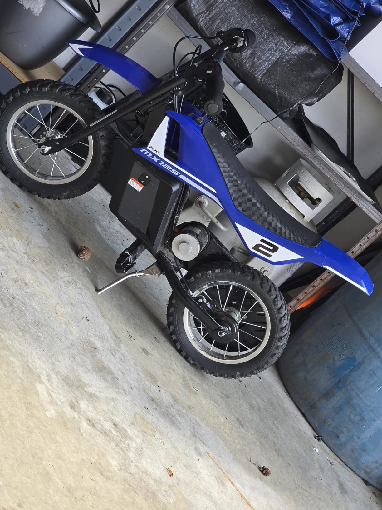 Razor MX125 Dirt Rocket Electric-Powered Bike with Authentic Motocross Geometry, Rear-Wheel Drive, 100-watt, High-Torque, Chain-Driven Motor, for Kids 7+, Blue customer photo 1
