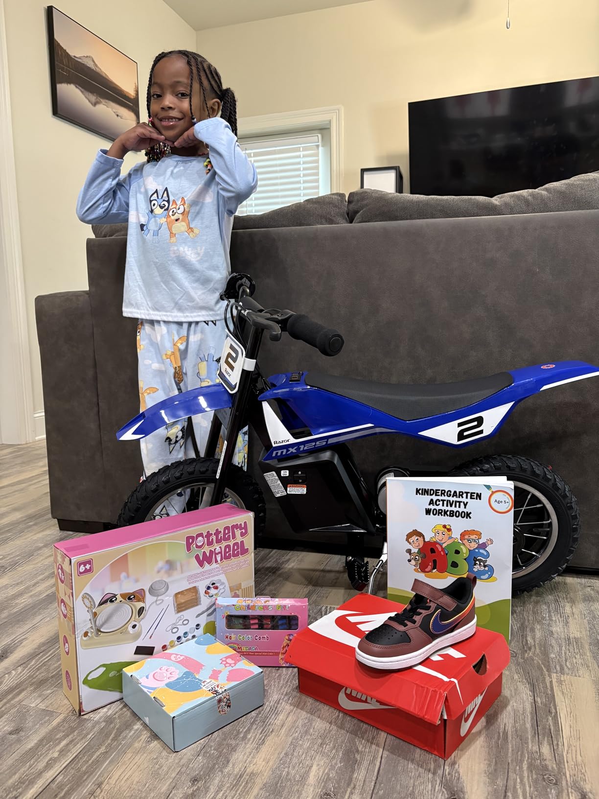 Razor MX125 Dirt Rocket Electric-Powered Bike with Authentic Motocross Geometry, Rear-Wheel Drive, 100-watt, High-Torque, Chain-Driven Motor, for Kids 7+, Blue customer photo 2