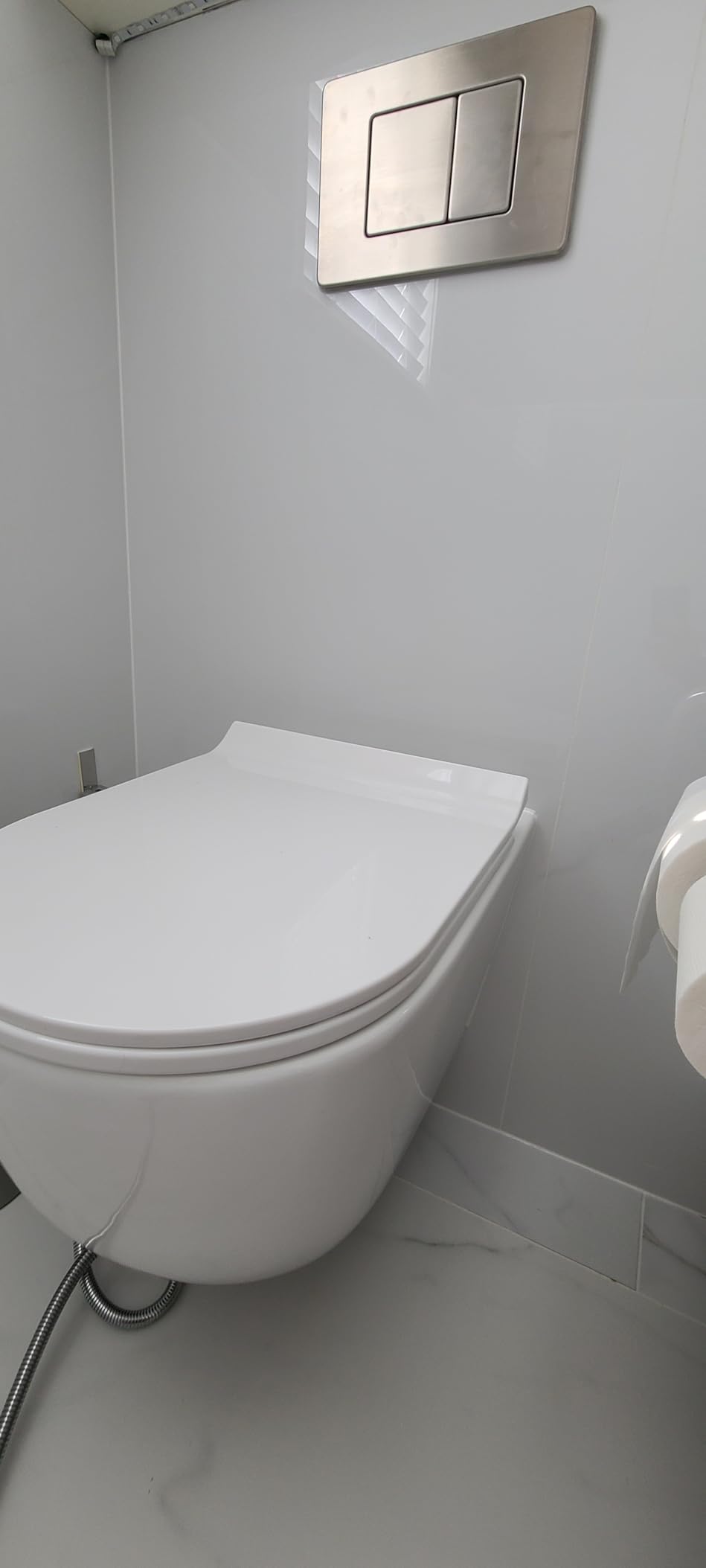 Eridanus Wall Hung Toilet, 2x4 In Wall Tank Carrier, Dual Flush, White customer photo 1