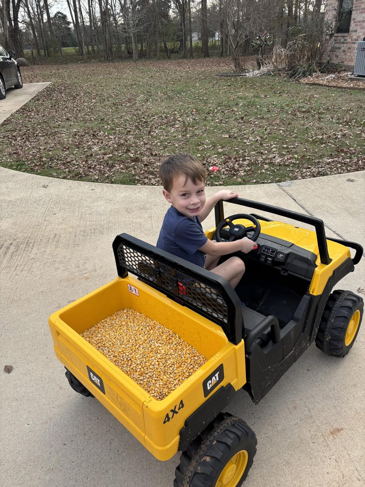ANPABO Licensed Caterpillar 24V Ride On Toys with Dump Bed and Shovel | 2 seater ride on dump truck, remote control, 4x100w motors, up to 5mph, rear shock absorbers, bluetooth, gift for kids 3-6 customer photo 1