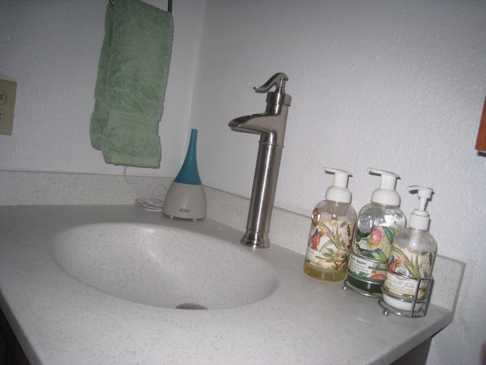 Swan VT02225.035 Ellipse 25-in L x 22-in W x 7.25-in H Solid Surface Vanity Top, Arctic Granite customer photo 1