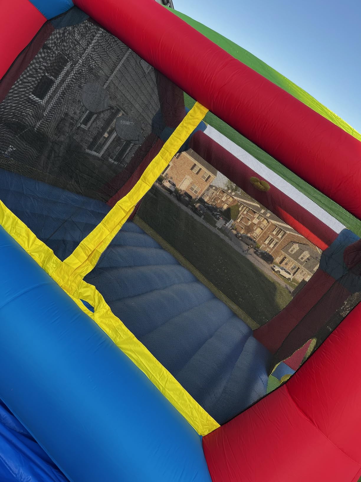 Bounceland Inflatable Party Castle Bounce House Bouncer, 16 ft L x 13 ft W x 10.3 ft H, Basketball Hoop, Removable Sun Roof, UL Strong Blower included, Fun Slide and Bounce Area, Castle Theme for Kids customer photo 1