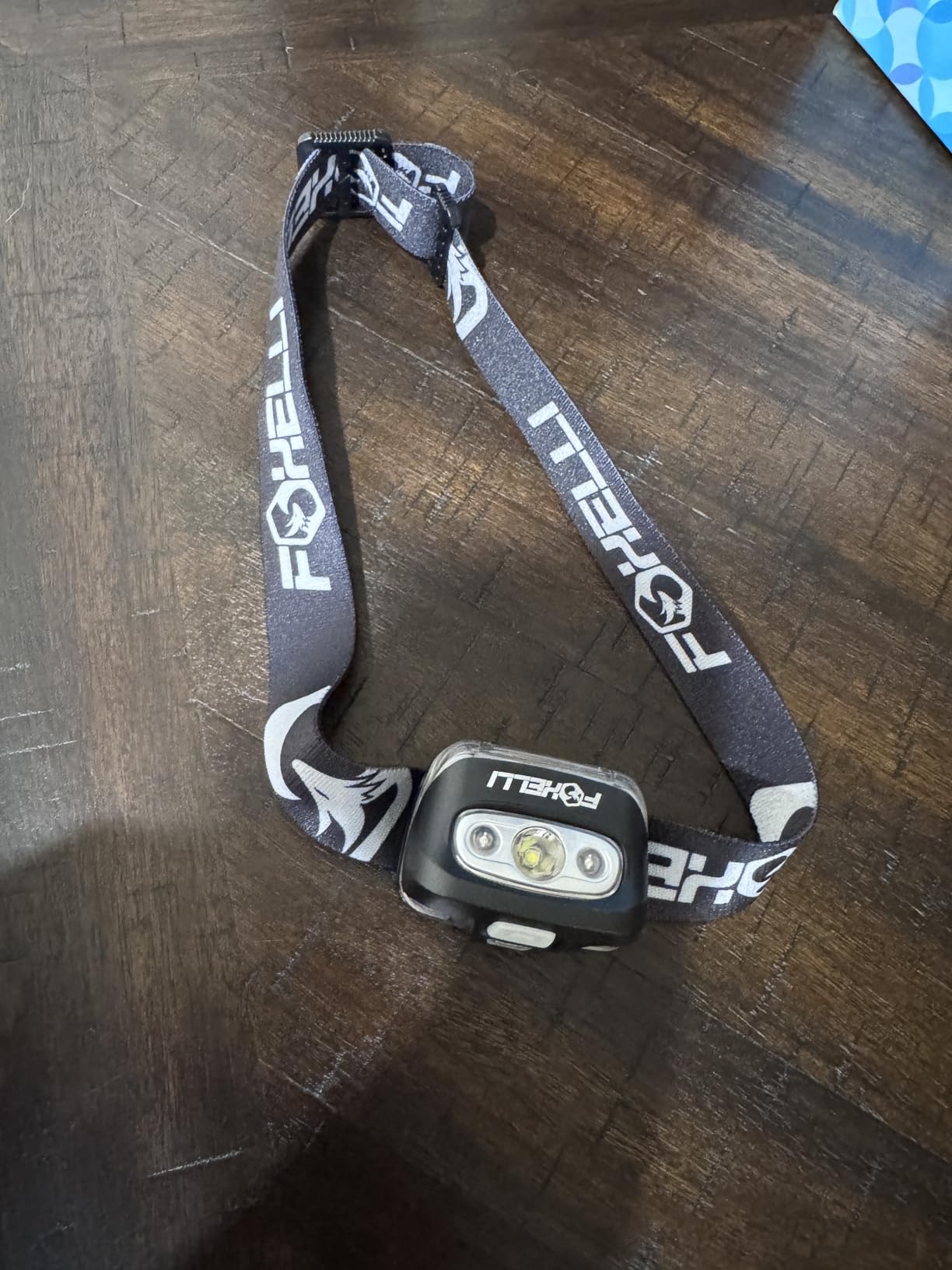 Foxelli Headlamp Battery Powered, IPX5 Waterproof, 45-Hour Runtime - Lightweight 3.2oz LED Head Lamp with White & Red Light, 5 Modes, Head Lights for Forehead, 3 AAA Included customer photo 1