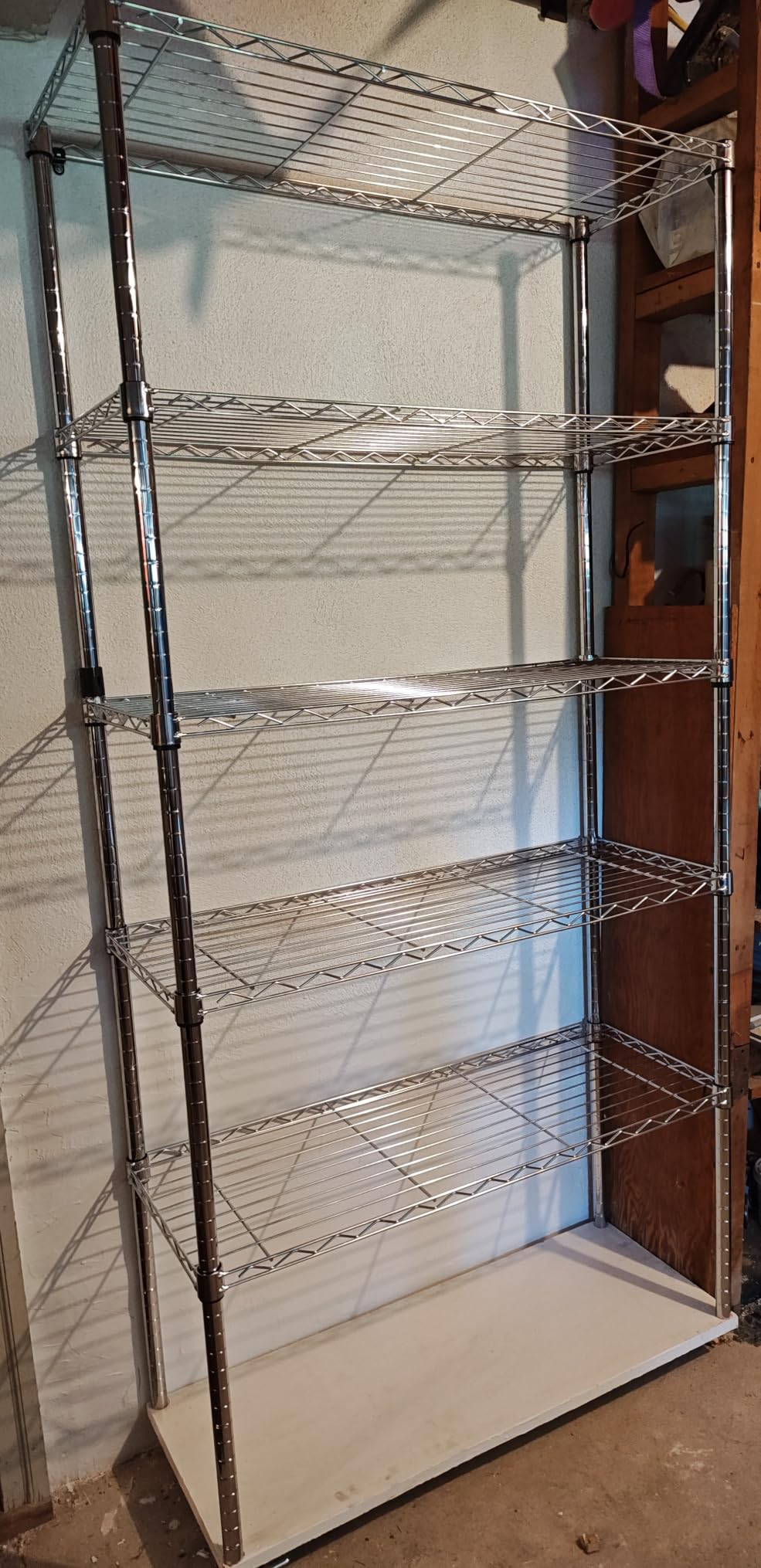 Amazon Basics 4-Shelf Adjustable Heavy Duty Storage Shelving Unit with Wheels, No-Tool Easy Assembly, Garage Shelving, Metal Wire Rack with Casters and Leveling Feet, 36
