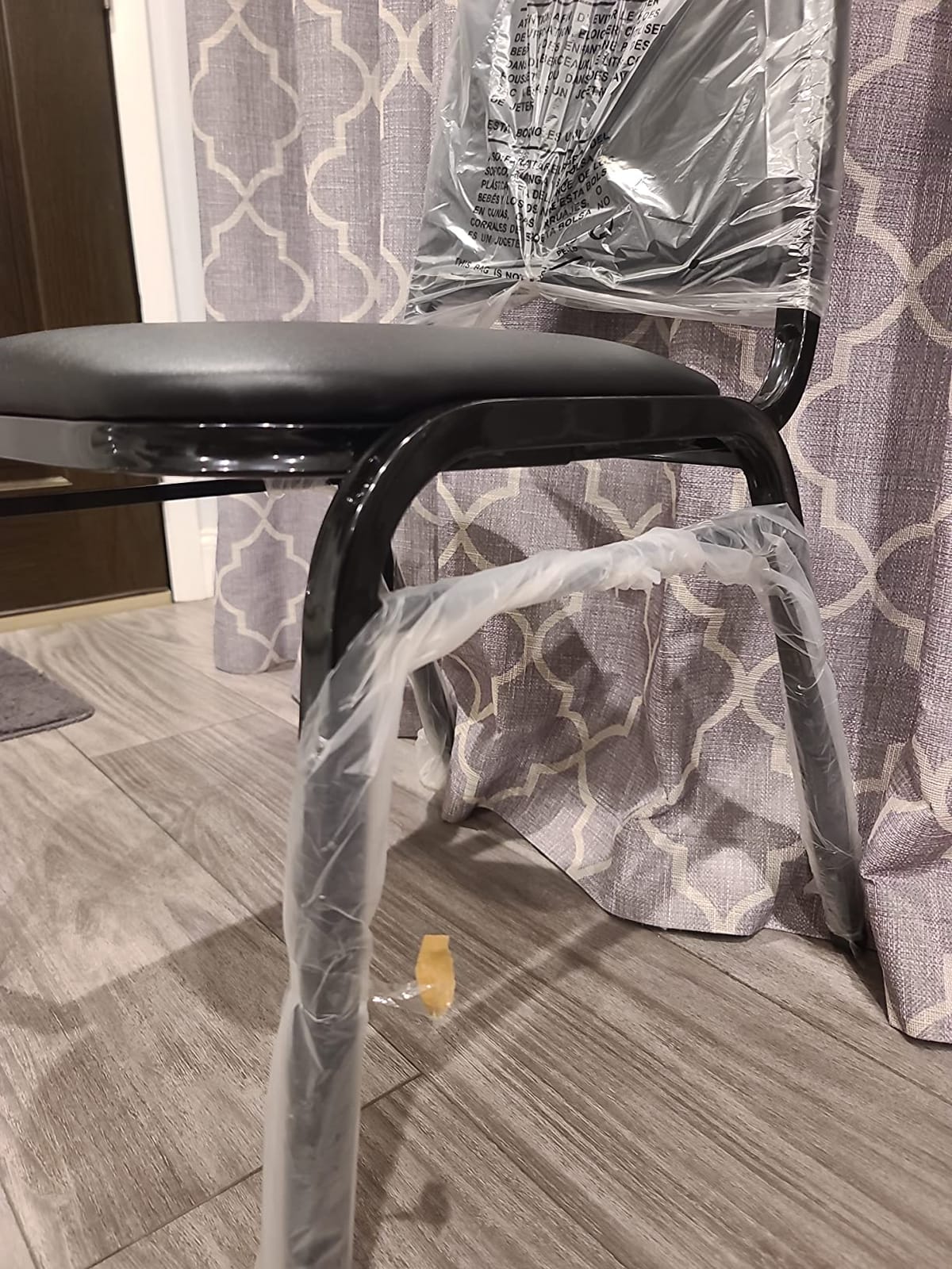 EMMA + OLIVER Black Vinyl Trapezoidal Back Stacking Banquet Chair | Black Frame, Vinyl Upholstery customer photo 2