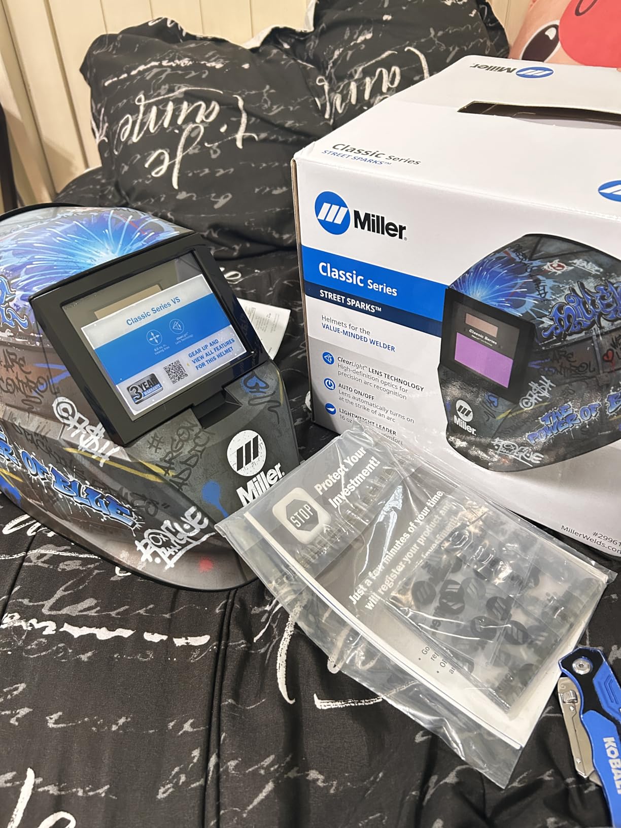 Miller Classic Series Welding Helmet, ClearLight, Shade 8-13, Black | For the value-minded welder; TIG/MIG; variable shade 8-13; HD optics; comfortable headgear customer photo 1