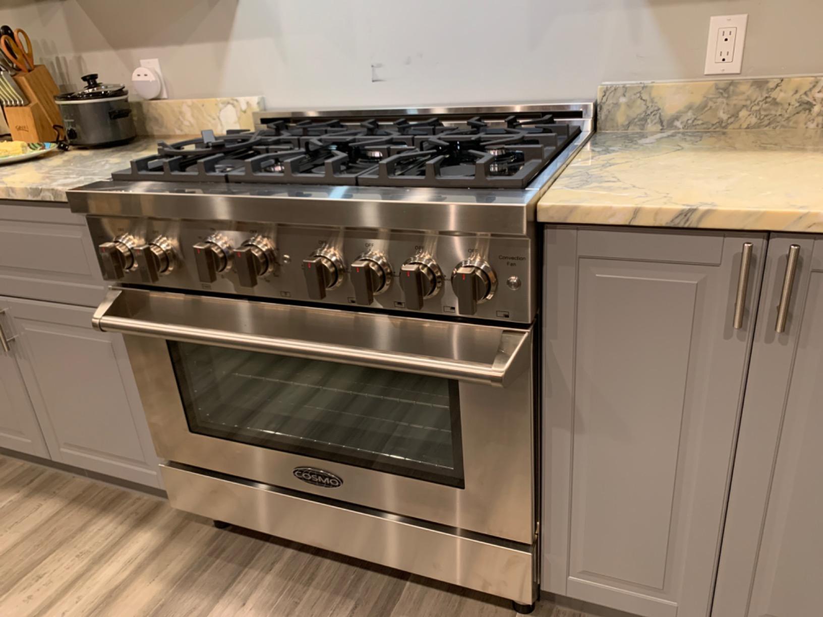 48 in. Vista Coll 6.6 cu ft 8 Burner Double Oven Gas Range, Stainless Steel | Cosmo COS-GRP486G LED Light Panel, Cast Iron Grates, Auto Re-Ignition, Griddle Attachment, Liquid Propane Convertible customer photo 1