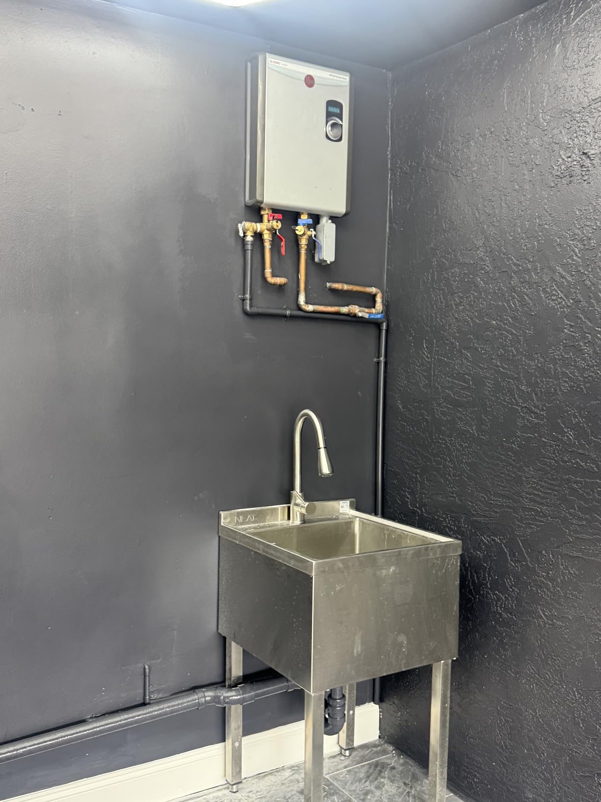 Rheem 8kW Multi Fixture Tankless Electric Water Heater - 240V customer photo 1